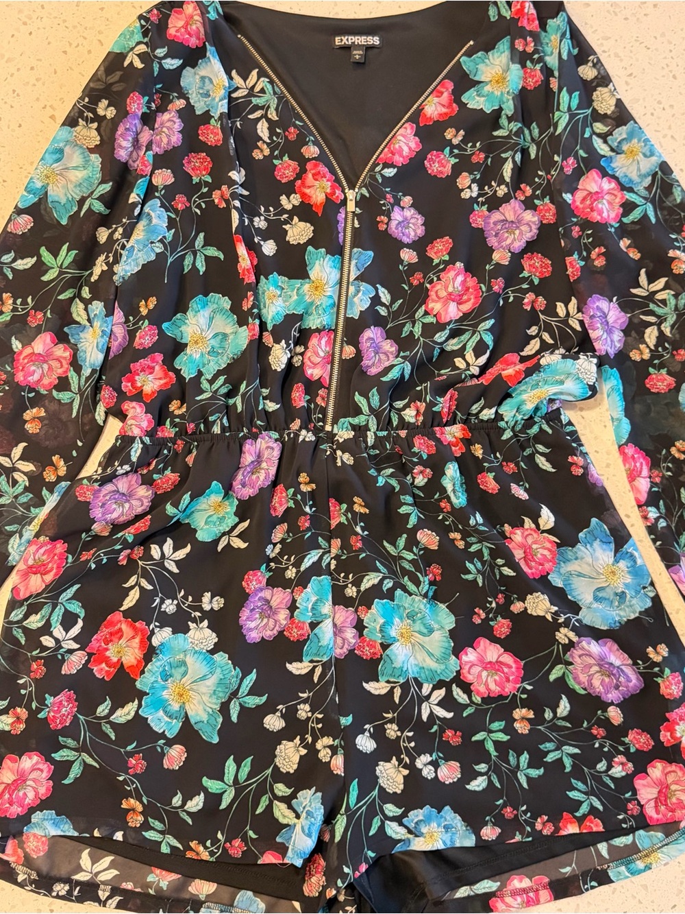 Express Black Floral Zip-Front Romper with Bright Blooms
